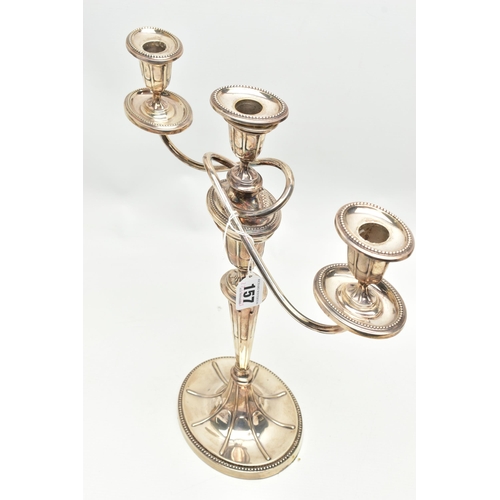 157 - A GEORGE V SILVER THREE LIGHT CANDELABRUM OF NEO-CLASSICAL STYLE, the oval removable sconces and dri... 