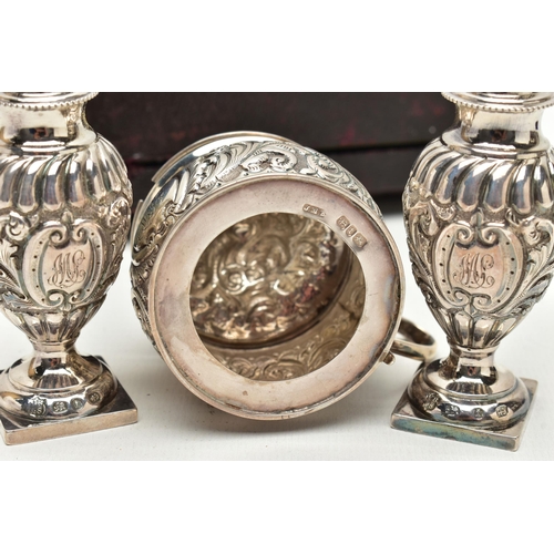 158 - A CASED LATE VICTORIAN FOUR PIECE SILVER CRUET SET, comprising a pair of baluster pepperettes with p... 