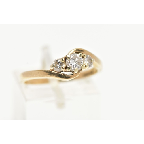 16 - A 9CT GOLD THREE STONE DIAMOND RING, three round brilliant cut diamonds, approximate total diamond w... 