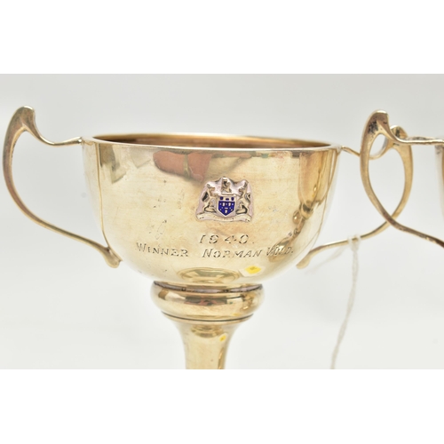 165 - THREE 20TH CENTURY SILVER TWIN HANDLED TROPHY CUPS, comprising two with enamelled crests, one inscri... 