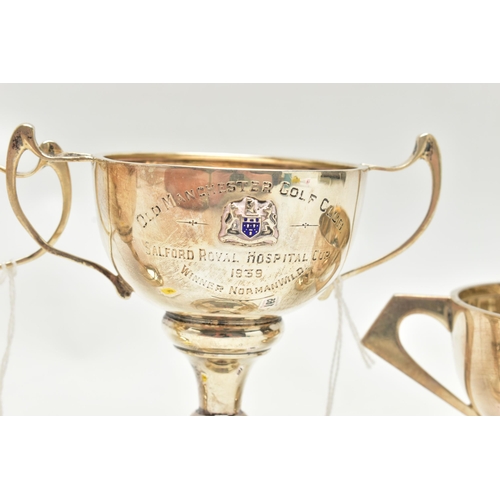 165 - THREE 20TH CENTURY SILVER TWIN HANDLED TROPHY CUPS, comprising two with enamelled crests, one inscri... 