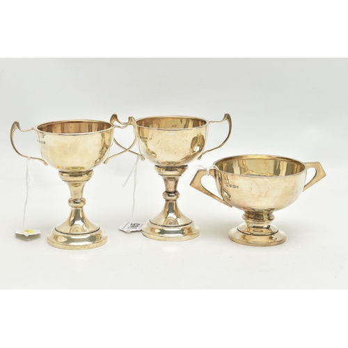 165 - THREE 20TH CENTURY SILVER TWIN HANDLED TROPHY CUPS, comprising two with enamelled crests, one inscri... 