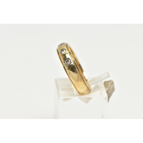 17 - A 9CT GOLD DIAMOND BAND RING, a yellow gold band ring with step cut edges, approximate width 4.5mm, ... 