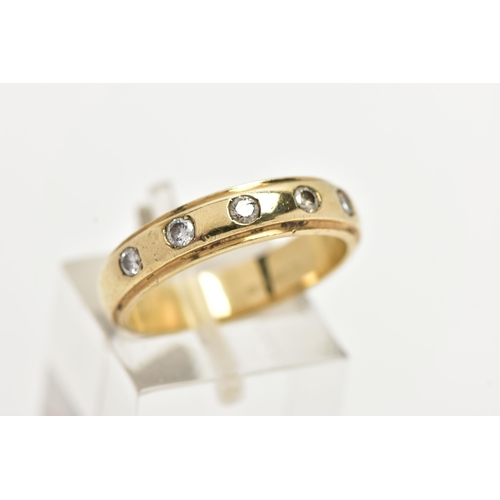 17 - A 9CT GOLD DIAMOND BAND RING, a yellow gold band ring with step cut edges, approximate width 4.5mm, ... 