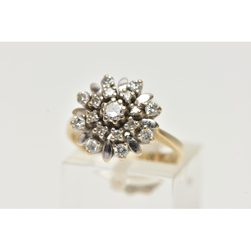 22 - A YELLOW METAL DIAMOND CLUSTER RING, flower shape cluster, set with round brilliant cut and single c... 