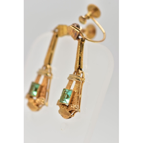 3 - A PAIR OF EARLY 20TH CENTURY EMERALD DROP EARRINGS, each of a tapered Art Deco design set to the cen... 