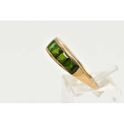 40 - A 9CT GOLD GEM SET RING, designed with a row of channel set, graduating square cut green tourmalines... 