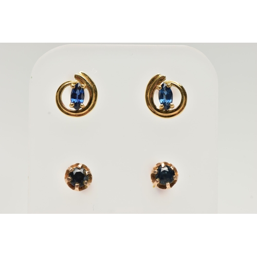 43 - TWO PAIRS OF SAPPHIRE SET EARRINGS, the first pair of an  openwork swirl design, centrally set with ... 