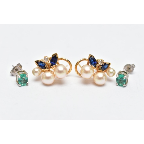 47 - TWO PAIRS OF EARRINGS, the first a pair of oval cut emerald stud earrings, each in a four claw white... 