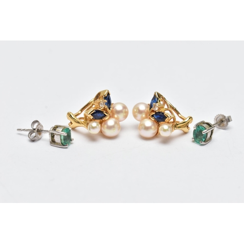 47 - TWO PAIRS OF EARRINGS, the first a pair of oval cut emerald stud earrings, each in a four claw white... 