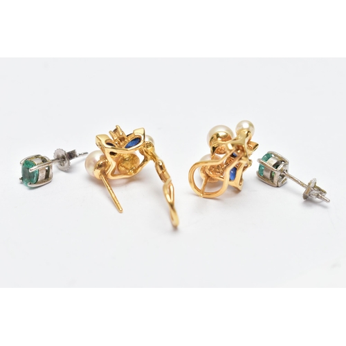 47 - TWO PAIRS OF EARRINGS, the first a pair of oval cut emerald stud earrings, each in a four claw white... 