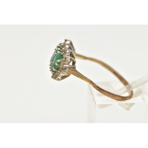 51 - A 9CT GOLD, EMERALD AND DIAMOND CLUSTER RING, designed with three claw set, oval cut emeralds, in a ... 