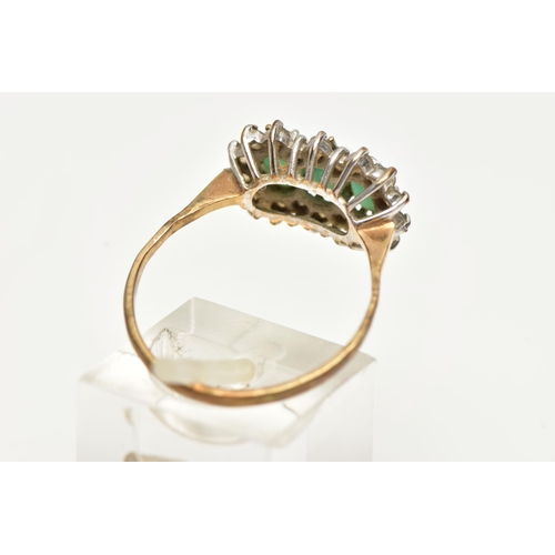 51 - A 9CT GOLD, EMERALD AND DIAMOND CLUSTER RING, designed with three claw set, oval cut emeralds, in a ... 