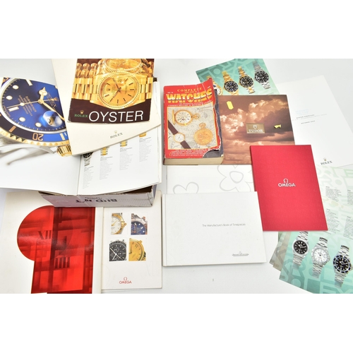 64 - A SELECTION OF WATCH CATALOGUES AND BOOKLETS, to include an 'Omega collection' booklet, an 'Omega ' ... 