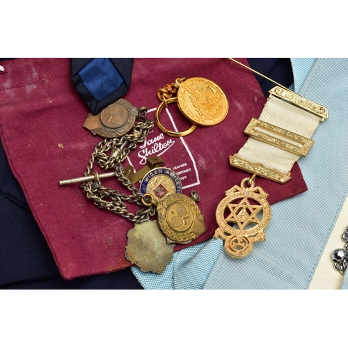 70 - A BOX OF MASONIC REGALIA, to include two silver gilt medallions, for the 'East and West Lancashire' ... 