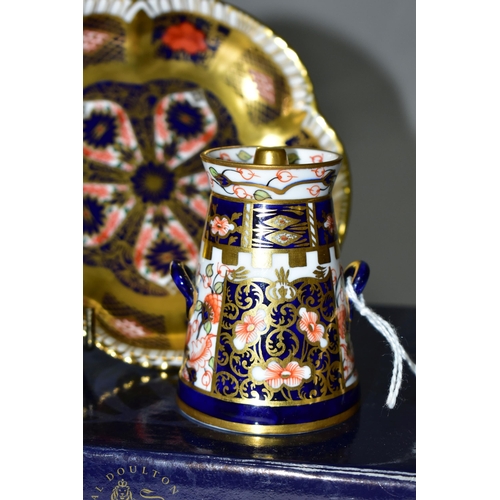 318 - TWO PIECES OF ROYAL CROWN DERBY GIFTWARES, comprising an Imari pattern 6299 miniature milk churn wit... 