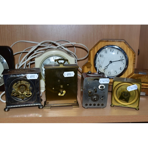 325 - ELEVEN ASSORTED CLOCKS, of various styles and materials, to include desk clocks, mantel clocks and o... 