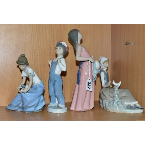 327 - THREE LLADRO FIGURES AND A NAO FIGURE, comprising model no 4660 Shepherdess with Dove, issued 1969-1... 