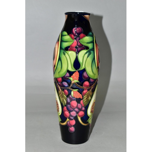 336 - A MOORCROFT POTTERY JUG WITH BOX, in the 'Queens Choice' pattern designed by Emma Bossons, of slende... 