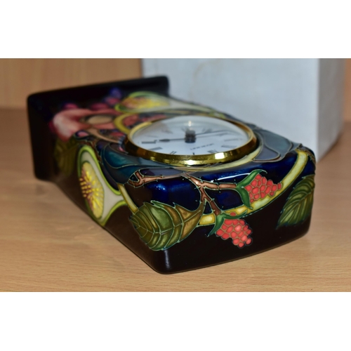 337 - A MOORCROFT POTTERY 'QUEENS CHOICE' PATTERN MANTEL CLOCK, designed by Emma Bossons, with impressed a... 