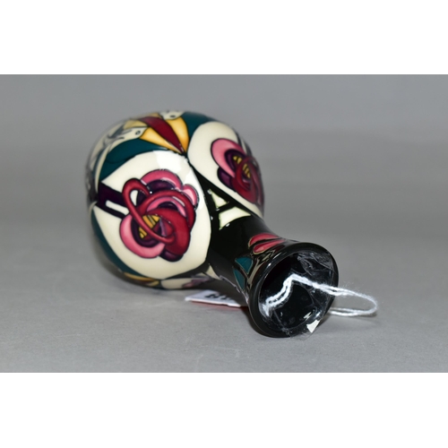 338 - A MOORCROFT POTTERY 'MELODY' PATTERN, bud vase with original box, designed by Sian Leaper, decorated... 