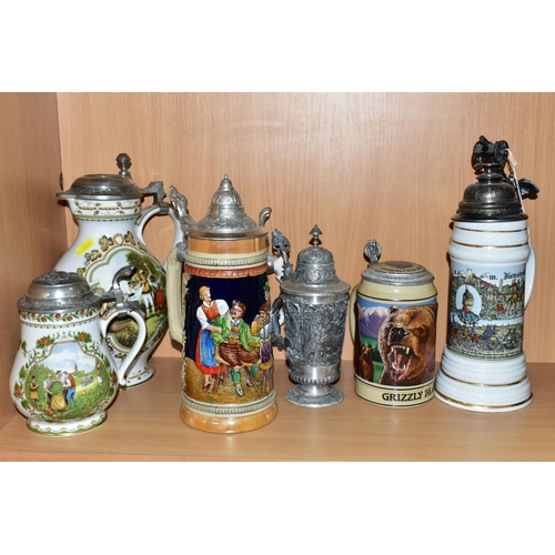 343 - A COLLECTION OF GERMAN STEINS, comprising a Franklin Mint anniversary 1986 Brouwerijmuseum porcelain... 