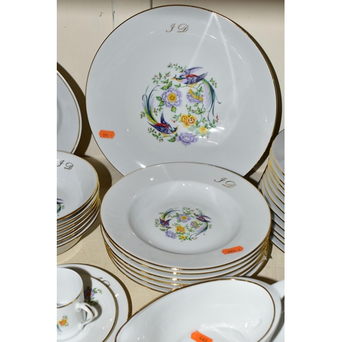 357 - A MONOGRAMMED ROYAL LIMOGES DINNER SERVICE, exclusively for Limoges Renaissance, monogrammed in gold... 