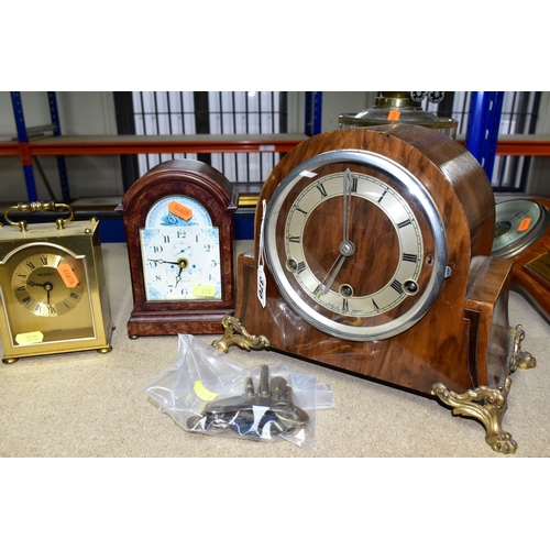 370 - A GROUP OF CLOCKS, A BAROMETER AND AN OIL LAMP, comprising a wooden cased 'The British Anvil Clock',... 