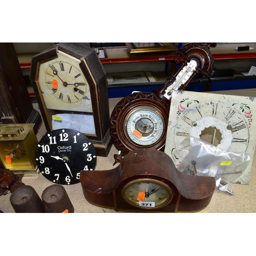 371 - A GROUP OF CLOCKS AND BAROMETERS, to include a cuckoo clock with weights, two mantel clocks, a woode... 