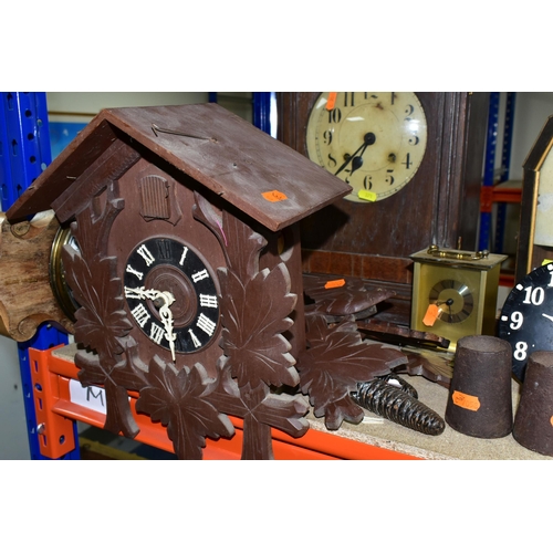 371 - A GROUP OF CLOCKS AND BAROMETERS, to include a cuckoo clock with weights, two mantel clocks, a woode... 