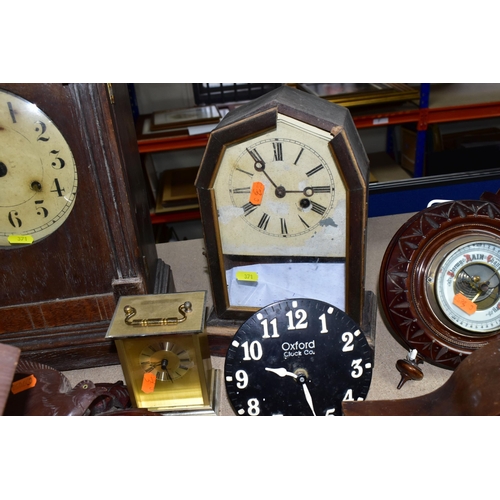 371 - A GROUP OF CLOCKS AND BAROMETERS, to include a cuckoo clock with weights, two mantel clocks, a woode... 