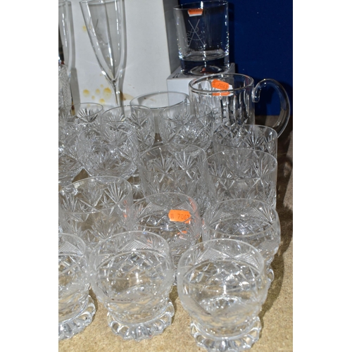 374 - A QUANTITY OF CUT CRYSTAL DRINKING GLASSES, more than sixty glasses to include nineteen faceted stem... 