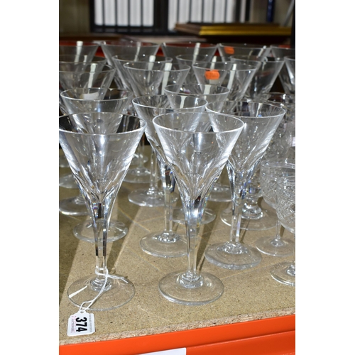 374 - A QUANTITY OF CUT CRYSTAL DRINKING GLASSES, more than sixty glasses to include nineteen faceted stem... 