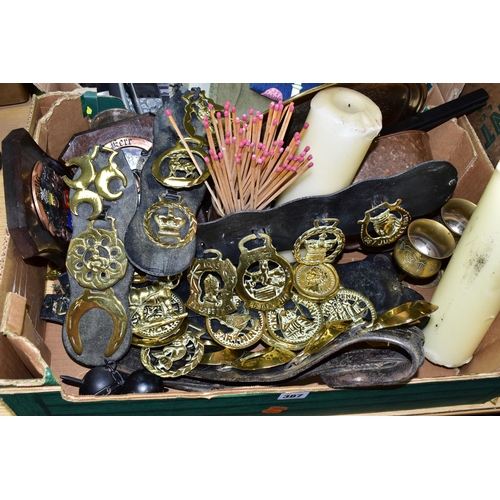 387 - TWO BOXES OF HOUSEHOLD SUNDRIES, to include ornamental horse brasses, brass ornaments, heraldic wall... 