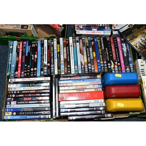 394 - NINE BOXES OF D.V.DS, BLUE RAY AND VIDEOS, approximately four hundred D.V.Ds and videos, assorted ti... 