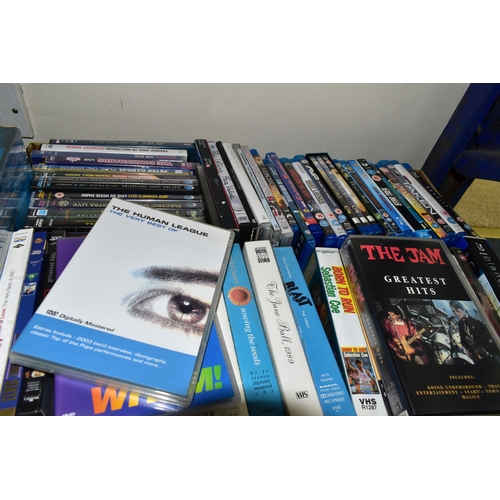 394 - NINE BOXES OF D.V.DS, BLUE RAY AND VIDEOS, approximately four hundred D.V.Ds and videos, assorted ti... 