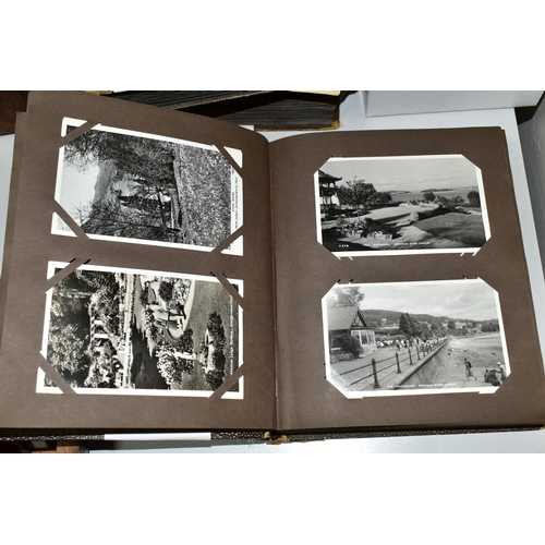 428 - POSTCARDS, Approximately 1075 Postcards in three albums and one box comprising topographical views, ... 