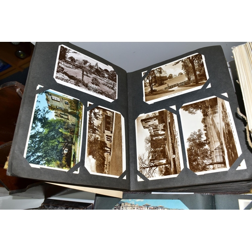 428 - POSTCARDS, Approximately 1075 Postcards in three albums and one box comprising topographical views, ... 