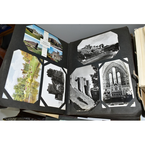 428 - POSTCARDS, Approximately 1075 Postcards in three albums and one box comprising topographical views, ... 