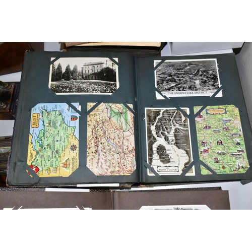 428 - POSTCARDS, Approximately 1075 Postcards in three albums and one box comprising topographical views, ... 