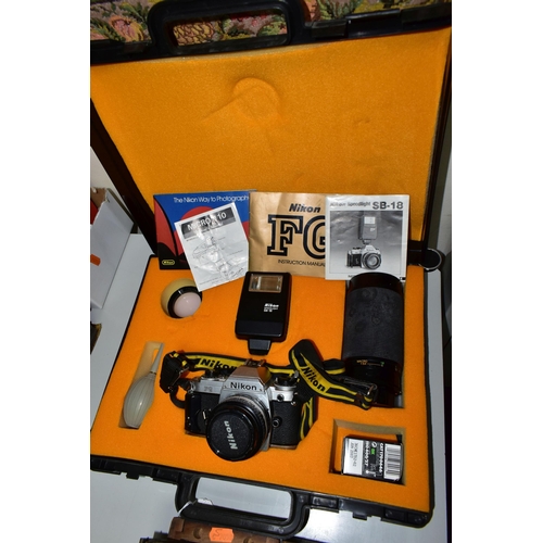 429 - A CASED NIKON FG CAMERA AND ACCESORIES, the camera fitted with a Nikon Series E f1.8 50mm lens, toge... 