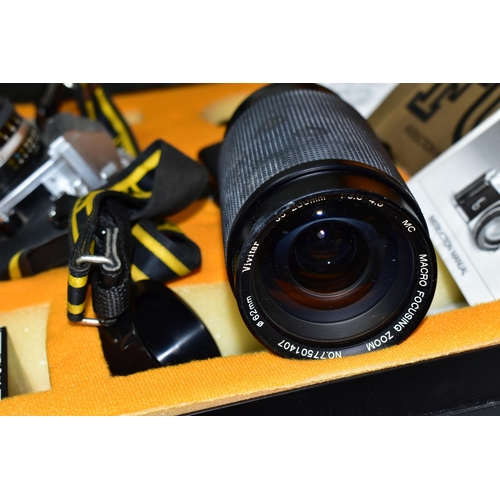 429 - A CASED NIKON FG CAMERA AND ACCESORIES, the camera fitted with a Nikon Series E f1.8 50mm lens, toge... 