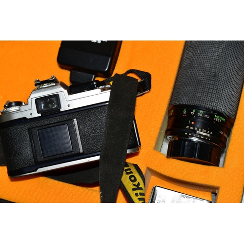 429 - A CASED NIKON FG CAMERA AND ACCESORIES, the camera fitted with a Nikon Series E f1.8 50mm lens, toge... 