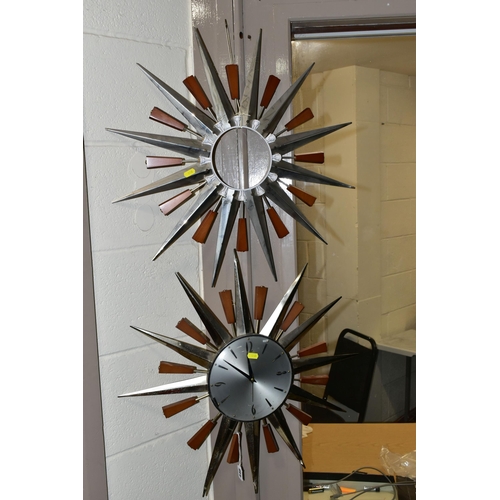 446 - FOUR MID-CENTURY SUNBURST WALL CLOCKS, and a teak and chrome sunburst clock frame (one ray tip sligh... 