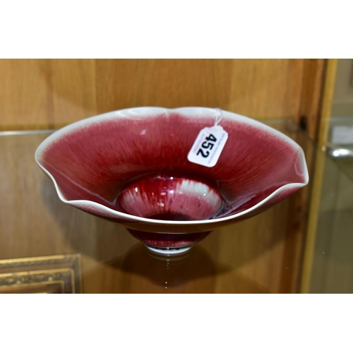 452 - IVAR MACKAY (1950-) A DOUBLE PETAL EDGED PORCELAIN BOWL, wheel thrown, copper red glazed inside and ... 