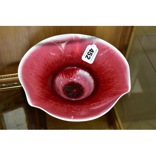 452 - IVAR MACKAY (1950-) A DOUBLE PETAL EDGED PORCELAIN BOWL, wheel thrown, copper red glazed inside and ... 