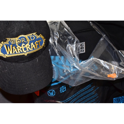 699 - BOX CONTAINING BLIZZARD CLOTHING AND ACCESSORIES, clothing includes a World of Warcraft costume, two... 