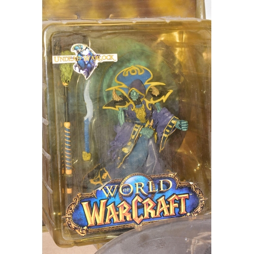 707 - BOX CONTAINING SEVEN SEALED WORLD OF WARCRAFT ACTION FIGURES, figures include the Undead Warlock, Va... 