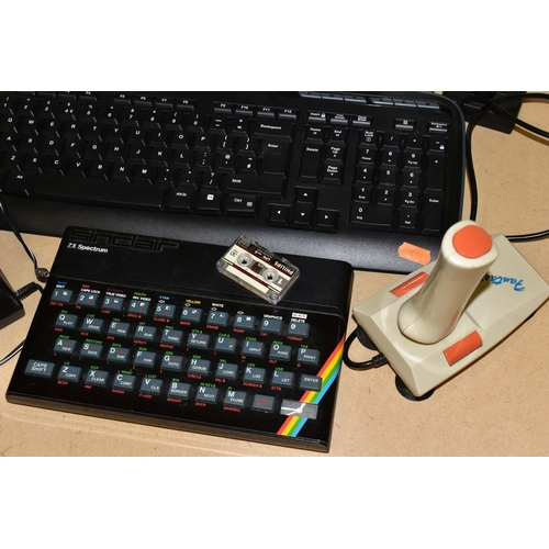 715 - A ZX SPECTRUM COMPUTER, HITACHI TELEVISION AND LOGITECH KEYBOARD, all items untested, but one of the... 