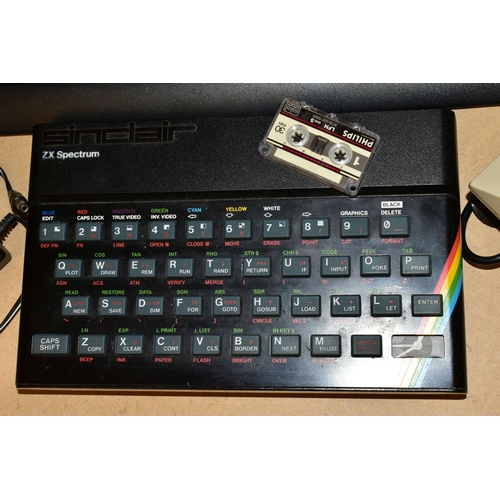 715 - A ZX SPECTRUM COMPUTER, HITACHI TELEVISION AND LOGITECH KEYBOARD, all items untested, but one of the... 